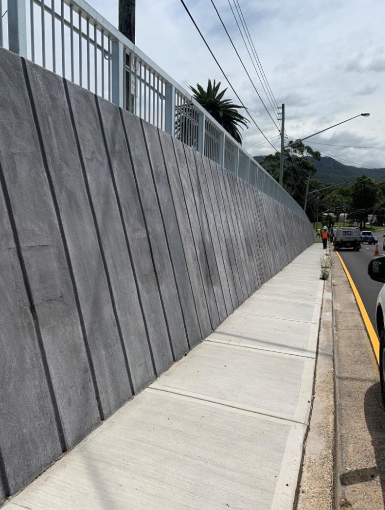 Pedestrian area made with steel-trowelled shotcrete.